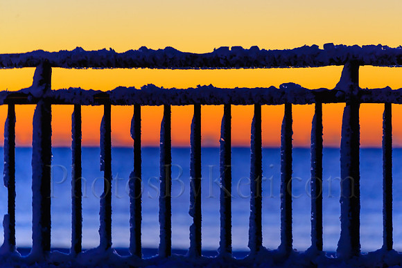 Snowy Fence Sunrise Silhouette