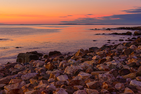 Rocky Shoreline At Sunrise